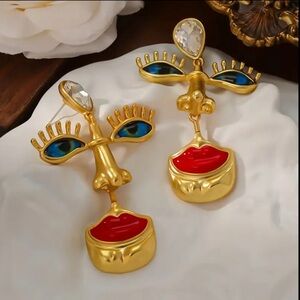 Schiaparelli inspired face features Statement Earrings